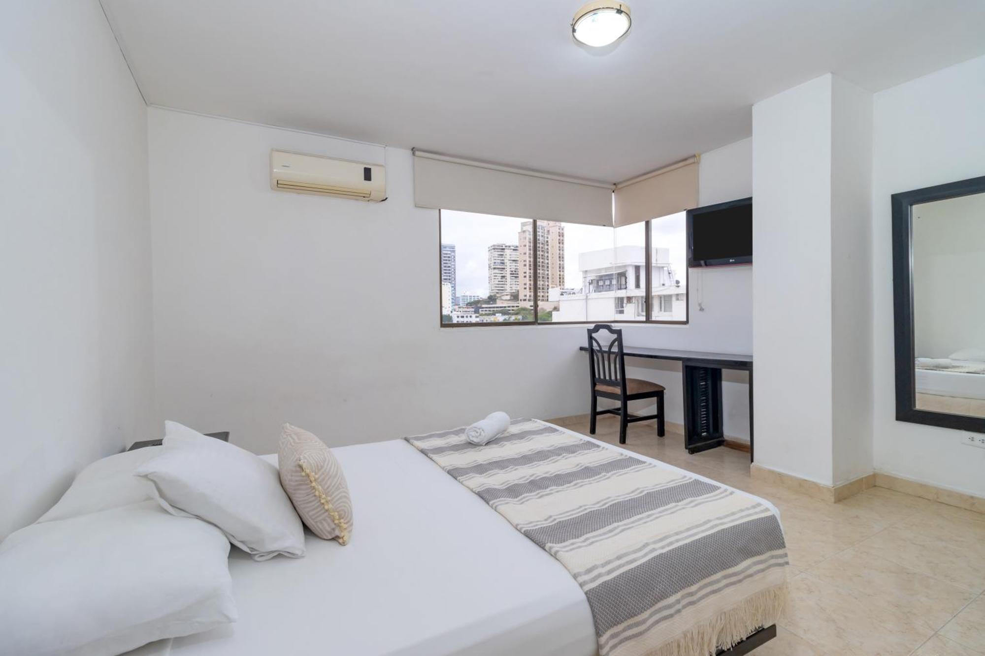 Hotel Axis Inn By Geh Suites 圣玛尔塔 外观 照片
